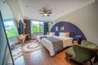 Huajian Meisu Hotel (Xinyang Railway Station Tianrun Plaza)