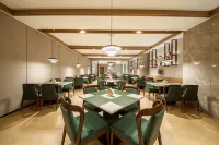 Zhijin Qiandong Hotel (Yudong Star) - servizio colazione