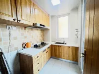 Xiaotuanzi | Scenic Resort Apartment (Naxianghai Diamond Beach) - Kitchens