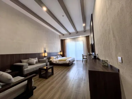 Uh mile homestay Отели рядом с достопримечательностью «Baimazhai Village»