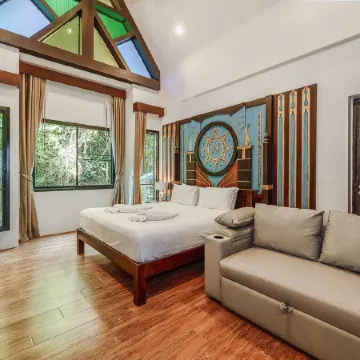 Coco Retreat Phuket Resort and Spa Отели рядом с достопримечательностью «Храм Чалонг»