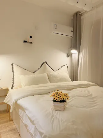 Qieman Homestay (Waishi University) Отели в г. Жушань