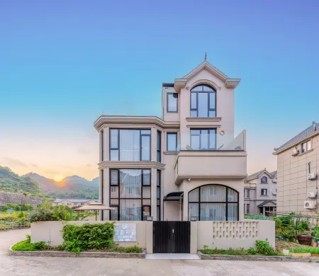 Cozy Homestay Отели рядом с достопримечательностью «Huangcheng Beach»