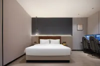 Mile Qingzhu Hotel (Hengyang Nanhua University)