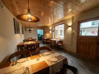 Muzi's Courtyard (Two Rivers & Four Lakes East-West Alley Branch)