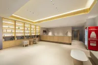 Blue Hotel (Baise Aegean Shopping Plaza Youjiang National Medical College)