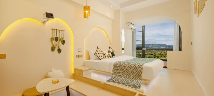 Huanzhu Riverside Holiday Boutique Stay (Gaozhuang Starlight Night Market) Hotel di Jinghong
