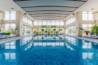 โรงแรมนานาชาติเคาซือ - ที่มีสระว่ายน้ำ