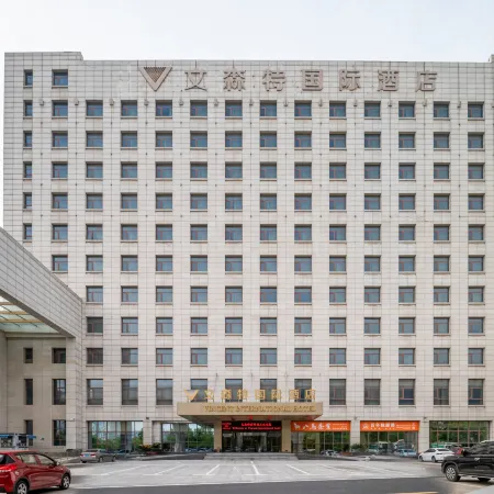Vincent International Hotel Отели рядом с достопримечательностью «Школа Чуньхуа, Новый район, Цуэндун»