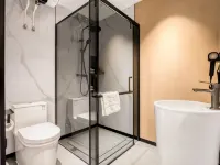 QiXi Hotel (HaXi Wanda Plaza High-speed Railway Station) Hotel dekat Stasiun Kereta Harbin Barat