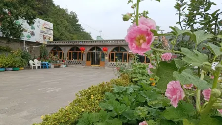 Muping Chaoxing Farmhouse (Jinshanling Great Wall Branch) Отели в г. Луаньпин
