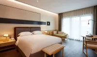 Zhejia Apartment Hotel (Ningbo Cixi Hangzhou Bay Fangte Resort Century City Shopping Center)