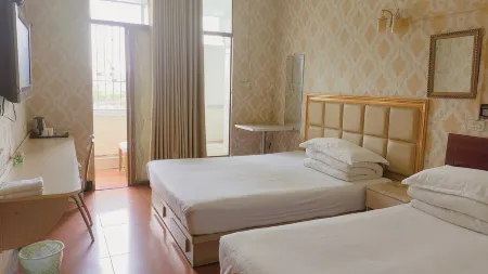 Xingang Apartment Отели рядом с достопримечательностью «Wuhan Institute of Engineering and Technology Teaching Building 3»