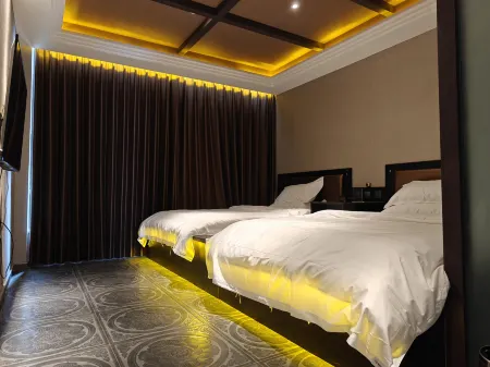 manguboyuejiudian Отели рядом со станцией Minquan North Railway Station