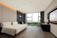 Quzhou Longyou Rongchang East Road Yaduo Hotel Các khách sạn ở Long Du