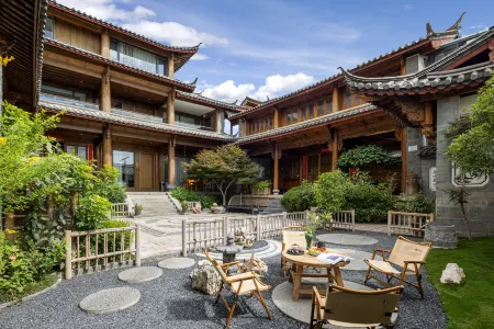 Lijiang Ma'an Linlu Boutique Homestay Отели рядом с достопримечательностью «Wenfeng Temple»