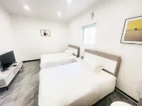 Yingcheng Garden Accommodation (Zibo Ceramics Liuliguan Fuli Wanda Plaza) - พร้อมระเบียง