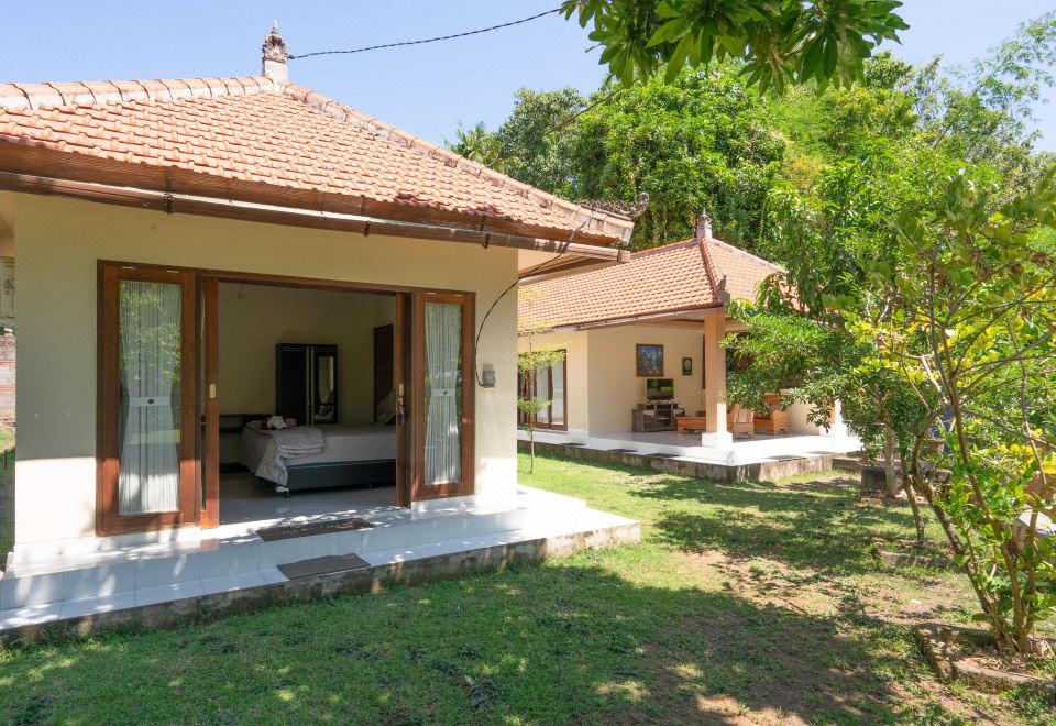 RedDoorz 아마벨라 가든 객실