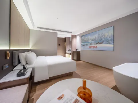 Baoting International Hotel (Yiwu Suxi Branch) Отели рядом с достопримечательностью «Jinhua Qilu Mountain»