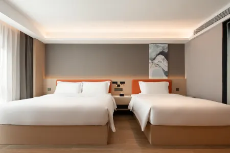 Meilin Holiday Hotel Отели рядом с достопримечательностью «Coconut Grand View Garden»