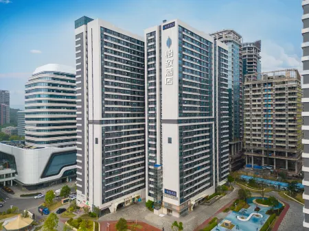 EZZI Hotel(Guangzhou Baoneng Performing Arts Center) Отели рядом с достопримечательностью «Ximing Happy World Huaxia Shijia City Paradise»