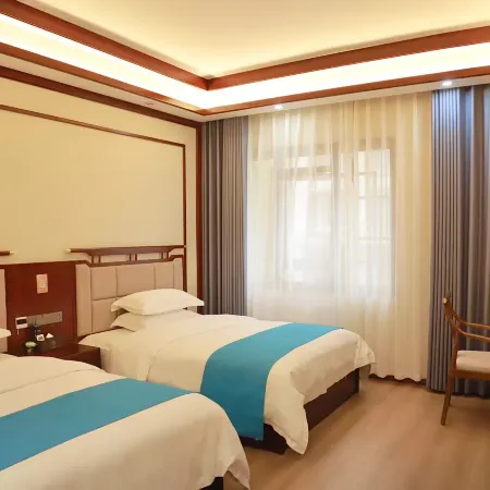 Weixin Zhaxi Hotel Weixin İlçesi otelleri