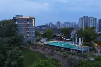 Chongqing Huafang Hotel Отели рядом с достопримечательностью «Музей Нейтрального Искусства Ло»