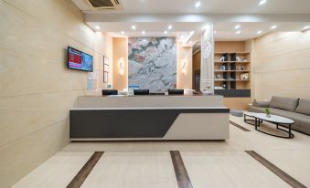 Huahuitong Hotel (Wujiang Shaoguan Station)