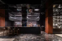 IntercityHotel麗江古城大水車ホテル - バー