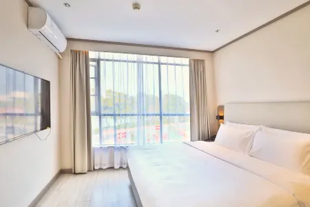 โรงแรม HanTing (ประตูตะวันออกพื้นที่ทิวทัศน์ชี่ซิงหยาน จ้าวชิง)
