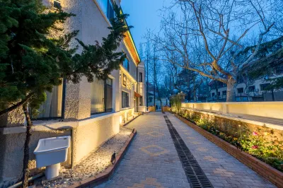 Qingdao Badaguan Jingli Villa Hotel Отели рядом с достопримечательностью «Жители Цзяйши»
