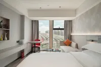 โรงแรมนานาชาติเป่าลี่ หยางเจียง (สาขา จัตุรัสไป๋หลี่ เขตทิวทัศน์ซีเซอะ)