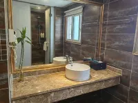 Qingmu Select Hotel (Xuancheng Langxi Jinmao Building)