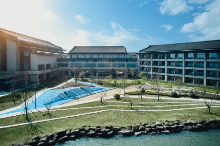 Jiaxing Greenland Primus Hotel (Xiangjiadang) Отели в г. Цзясин