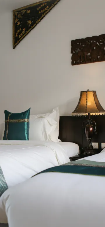 ห้องดีลักซ์ 2 เตียง พร้อมระเบียง