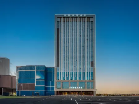 Pujing Weiting Hotel (Jinkunqiao) Отели рядом с достопримечательностью «Dongli Square»