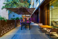 875 Art Hotel (Big Wild Goose Pagoda Tang Paradise) Отели в г. Янта