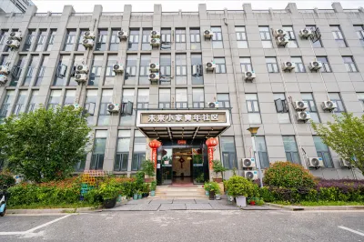 퓨처 샤오자 유스 커뮤니티 호텔 (상하이 바오산 시티 인더스트리얼 파크) 뿌리 조각 예술 엑스포 센터 주변 호텔