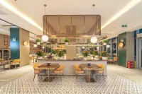 โรงแรมเทียนอี้ กอกดาลา (ศูนย์การค้าไทมส์ ซินซื่อ) - พร้อมอาหารเช้า