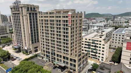 Home lnn (Shengzhou Wuyue Plaza Guanhenan Road Branch) Отели рядом с достопримечательностью «Huju Zoo»