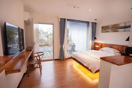 Muxin Jiayuan City B&B Отели в г. Дэбао