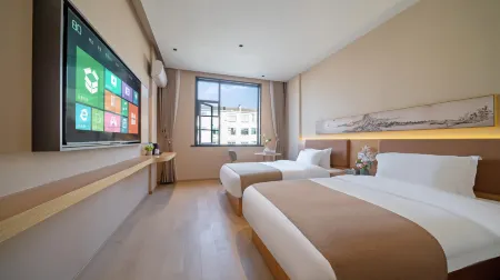 Jixu Hotel (Wuyuan High-speed Railway Station) Отели в г. Уюань