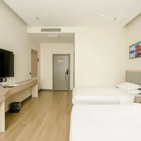 Pengxin Business Hotel (Kuqa Pedestrian Street)