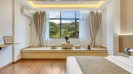 One Dimensional Hotel (Huangguoshu Scenic Area Branch) Отели рядом с достопримечательностью «Balinghe Bridge»