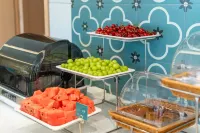 Magnotel Magnolia Hotel (Jiamusi Railway Station New Mart) - sarapan
