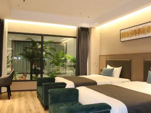 Wangcang Aijia Business Hotel