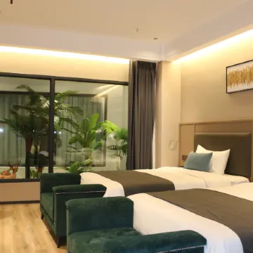 Wangcang Aijia Business Hotel