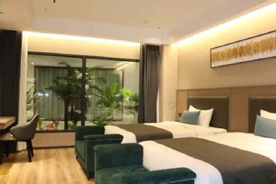 Wangcang Aijia Business Hotel