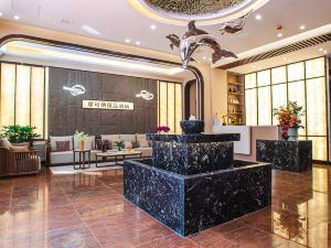 Dalian Xinghai Plaza Mokona Boutique Hotel