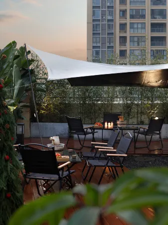 Dayu Apartment (Shuangliu Sports Center) Отели рядом с достопримечательностью «Seaside City»